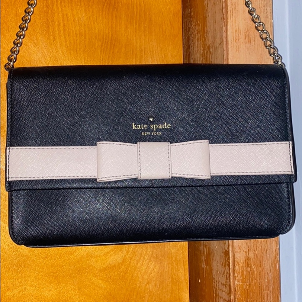 black kate spade purse with rose gold bow